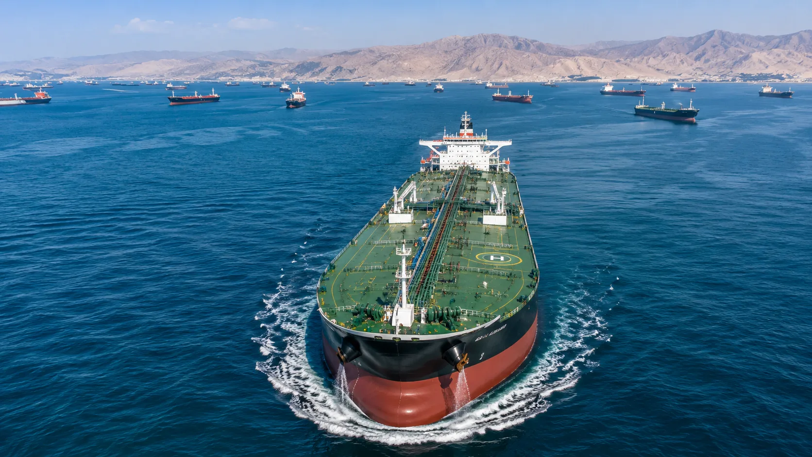 Large crude oil tanker sailing through the Strait of Hormuz as U.S. sanctions relief unlocks Iranian oil exports and billions in potential revenue for Tehran.