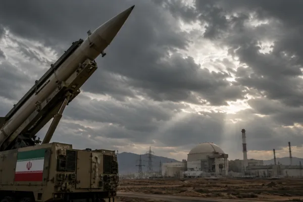 Iranian missile launcher near a nuclear facility as Iran declares it will continue pursuing nuclear weapons amid rising tensions with the United States and Israel.